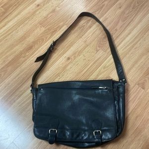 Leather briefcase with multiple pockets